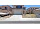 Charming two-story home with a two-car garage and low maintenance front yard at 8529 Gold Flash Ave, Las Vegas, NV 89129