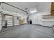Clean, well-organized garage with storage shelves and room for vehicles at 8529 Gold Flash Ave, Las Vegas, NV 89129
