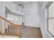 Bright living room featuring two-story ceilings and neutral carpeting at 8529 Gold Flash Ave, Las Vegas, NV 89129