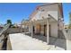 Covered back patio with brick walls on both sides at 8529 Gold Flash Ave, Las Vegas, NV 89129