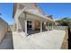 Wide outdoor patio with full covering and cement foundation at 8529 Gold Flash Ave, Las Vegas, NV 89129