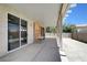 Covered patio area featuring a concrete slab and ample space at 8529 Gold Flash Ave, Las Vegas, NV 89129