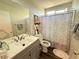 Well-lit bathroom featuring updated fixtures and a shower/tub combination at 8898 Promised Land Ave, Las Vegas, NV 89148