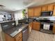 Well-lit kitchen with stainless steel appliances and plenty of countertop space at 8898 Promised Land Ave, Las Vegas, NV 89148