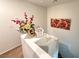 Bright stairway featuring neutral walls and decorative floral arrangement at 8898 Promised Land Ave, Las Vegas, NV 89148