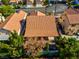Private backyard with covered patio space and mature trees offering shade and privacy at 9116 Cypress Point Way, Las Vegas, NV 89117
