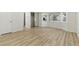 Spacious bedroom with wood floors, bay window, and ample natural light at 9116 Cypress Point Way, Las Vegas, NV 89117