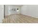 Spacious bedroom with wood floors, bay window, and ample natural light at 9116 Cypress Point Way, Las Vegas, NV 89117