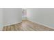Bright bedroom featuring neutral walls and stylish wood-look flooring at 9116 Cypress Point Way, Las Vegas, NV 89117