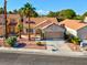 Charming single-story home with well-maintained landscaping and a two-car garage at 9116 Cypress Point Way, Las Vegas, NV 89117