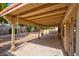 Large covered patio with wood beams offers an inviting outdoor living space at 9116 Cypress Point Way, Las Vegas, NV 89117