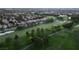 A drone shot of a pristine golf course winds through a residential neighborhood at 912 Pro Players Dr, Las Vegas, NV 89134