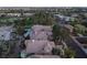 Aerial view of home and backyard pool near golf course at 912 Pro Players Dr, Las Vegas, NV 89134
