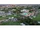 A spectacular aerial view shows the lush golf course and the luxurious home overlooking the green at 912 Pro Players Dr, Las Vegas, NV 89134