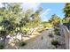Backyard featuring mature shade trees at 912 Pro Players Dr, Las Vegas, NV 89134