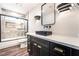 Bathroom with modern vanity, under-mount sink, and luxurious shower at 912 Pro Players Dr, Las Vegas, NV 89134