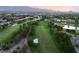 Picturesque aerial shot of a well-maintained golf course featuring mature trees and pristine sand traps at 912 Pro Players Dr, Las Vegas, NV 89134