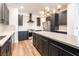 Well-equipped kitchen with a large island, stainless steel appliances, and dark cabinetry at 912 Pro Players Dr, Las Vegas, NV 89134