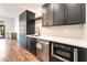 Stylish kitchen boasts stainless steel appliances, dark cabinetry, and modern countertops at 912 Pro Players Dr, Las Vegas, NV 89134