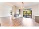Bright, open living room featuring a fireplace and sliding glass doors to the outdoors at 912 Pro Players Dr, Las Vegas, NV 89134
