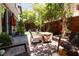 Backyard featuring a patio table and chairs at 10526 Harvest Wind Dr, Las Vegas, NV 89135