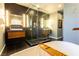 Spa-like bathroom with a modern freestanding tub and glass-enclosed shower at 10526 Harvest Wind Dr, Las Vegas, NV 89135