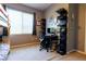 A bedroom featuring bunk beds, a desk with computer and organized shelving and storage for creative exploration at 10526 Harvest Wind Dr, Las Vegas, NV 89135