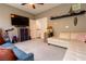Bedroom featuring a sofa and a ceiling fan at 10526 Harvest Wind Dr, Las Vegas, NV 89135