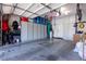 A spacious garage with built in storage cabinets and overhead storage at 10526 Harvest Wind Dr, Las Vegas, NV 89135