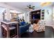 Comfortable living room with ceiling fan, hardwood floors and built-in media center at 10526 Harvest Wind Dr, Las Vegas, NV 89135