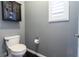 This powder room offers a sleek design with a modern vanity and stylish fixtures at 10526 Harvest Wind Dr, Las Vegas, NV 89135