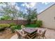 Serene backyard with patio, seating, and lush landscaping at 10987 Santorini Dr, Las Vegas, NV 89141
