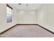 Empty bedroom with carpet, baseboards and natural light at 10987 Santorini Dr, Las Vegas, NV 89141
