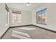 Empty bedroom with carpet, baseboards and natural light at 10987 Santorini Dr, Las Vegas, NV 89141