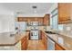 Well-equipped kitchen with stainless steel appliances and a center island at 10987 Santorini Dr, Las Vegas, NV 89141