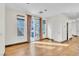 Bright living room with tile floors, natural light, and neutral paint at 10987 Santorini Dr, Las Vegas, NV 89141