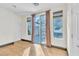 Bright living room with tile floors, natural light, and neutral paint at 10987 Santorini Dr, Las Vegas, NV 89141