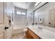 Bathroom featuring a shower-tub combination and a wood vanity at 1126 Winter Storm Dr, Henderson, NV 89052