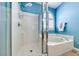 The bathroom boasts a tub/shower combo with tiled walls and chrome fixtures at 1126 Winter Storm Dr, Henderson, NV 89052