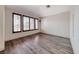 Light-filled with wood-look flooring, this room features recessed lights, and window blinds at 1126 Winter Storm Dr, Henderson, NV 89052