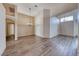 Large room featuring wood-look floors and decorative light fixtures and open entryway at 1126 Winter Storm Dr, Henderson, NV 89052