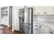 Modern kitchen with stainless steel appliances, lots of storage and quartz countertops at 11375 Ogden Mills Dr # 103, Las Vegas, NV 89135
