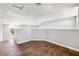 Loft area features a vaulted ceiling and wood-look flooring at 11375 Ogden Mills Dr # 103, Las Vegas, NV 89135