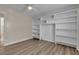 Spacious bedroom featuring built-in shelves, neutral paint and ceiling fan at 120 Dogwood St, Henderson, NV 89015