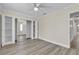 Bedroom includes closet, ceiling fan, and easy access to an adjacent bathroom at 120 Dogwood St, Henderson, NV 89015
