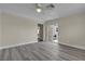 Bedroom boasts hardwood flooring, a ceiling fan, and easy patio access at 120 Dogwood St, Henderson, NV 89015