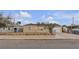 Charming single-story home with a well-maintained front yard and a detached garage at 120 Dogwood St, Henderson, NV 89015