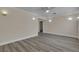Bright living room with new floors, modern lighting and crown molding at 120 Dogwood St, Henderson, NV 89015