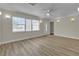 Bright living room featuring new flooring, lighting, and an open floor plan at 120 Dogwood St, Henderson, NV 89015