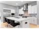 Modern kitchen features stainless steel appliances, a large island, and sleek cabinetry at 1204 Moselle Ct, Las Vegas, NV 89144